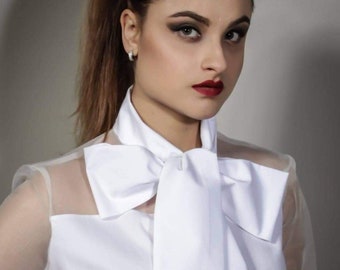 Elegant women&#39;s shirt with bow in cotton and organza.