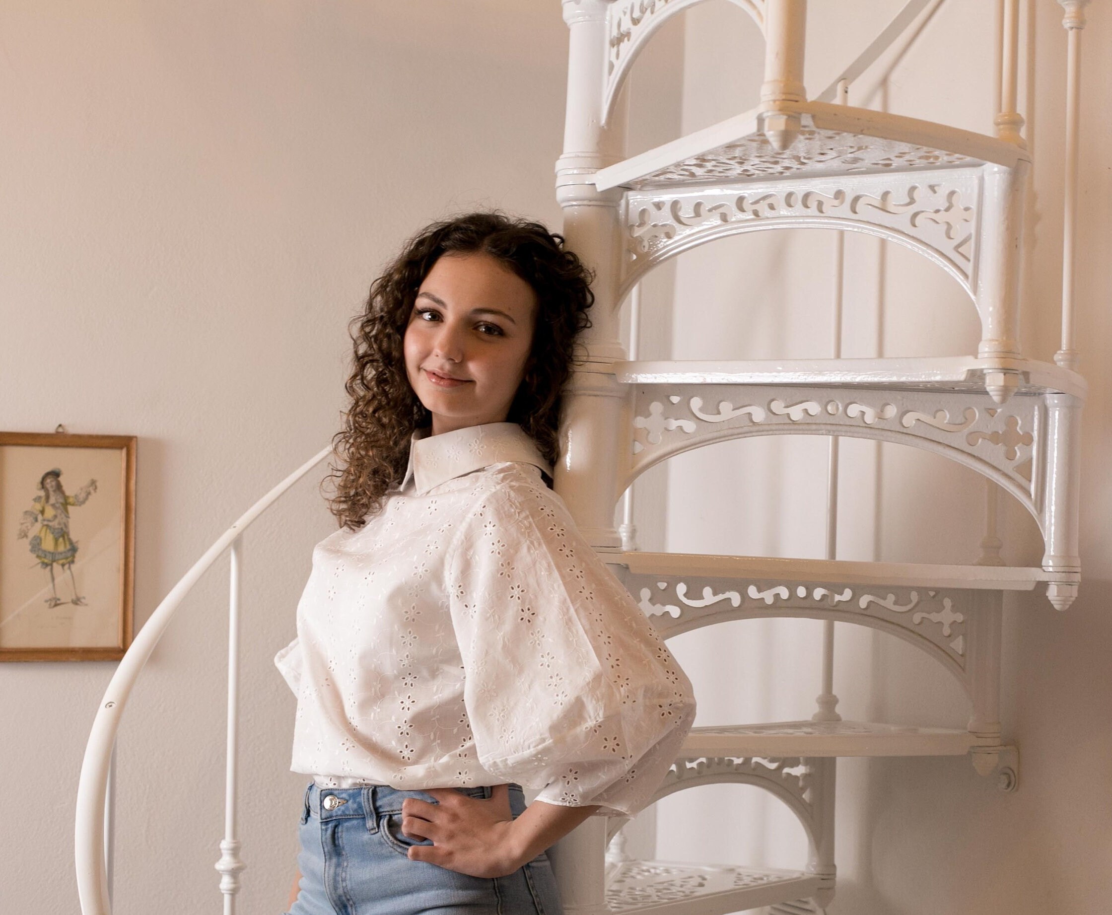 Women's shirt in San Gallo lace, lantern sleeve and buttoning at the back.