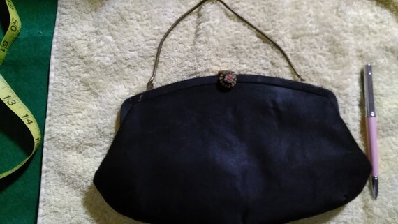 black clutch bag with chain