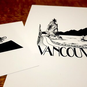May include: Two black and white illustrations. The first shows a person riding a bike over a mountain. The second shows a mountain with a lighthouse and the word "VANCOUVER" underneath.