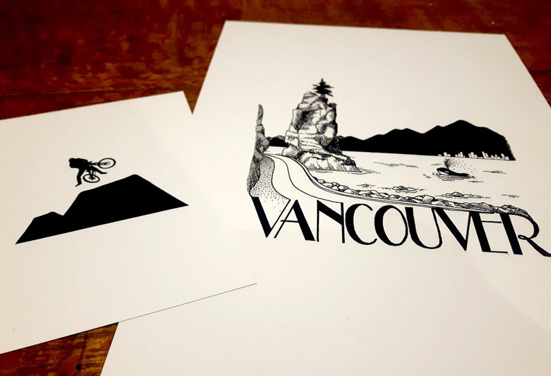 May include: Two black and white illustrations. The first shows a person riding a bike over a mountain. The second shows a mountain with a lighthouse and the word "VANCOUVER" underneath.