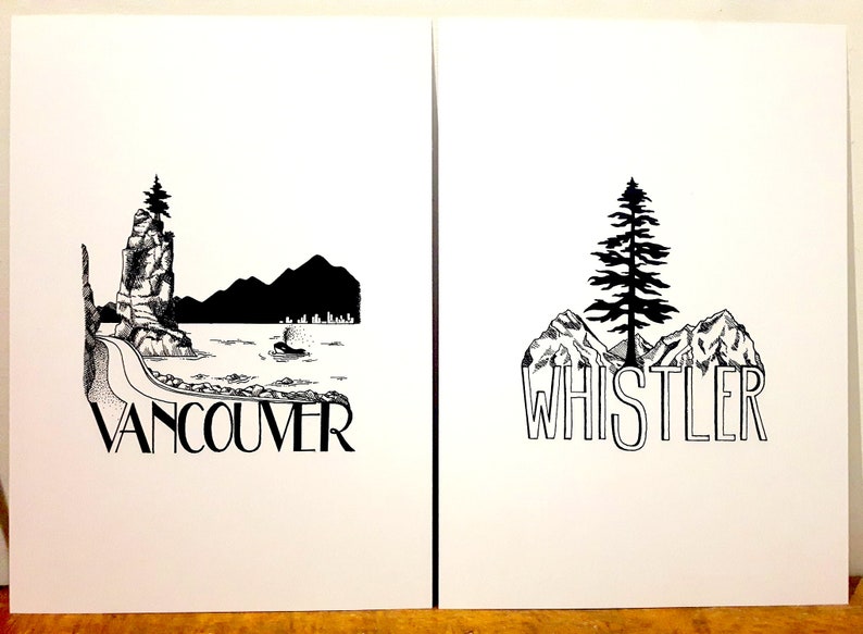 May include: Two black and white illustrations of cityscapes. The first illustration depicts a mountain range, a rocky island, a road, and a boat in the water. The text "VANCOUVER" is below the illustration. The second illustration depicts a mountain range, a pine tree, and the text "WHISTLER".