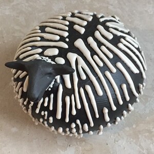Sculpted Ceramic Horse Black and White Each peice is unique and made by my self Handmade from stoneware clay