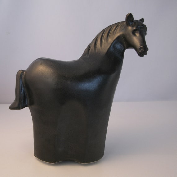 Sculpted Ceramic Horse Black and White Each peice is unique and made by my self Handmade from stoneware clay