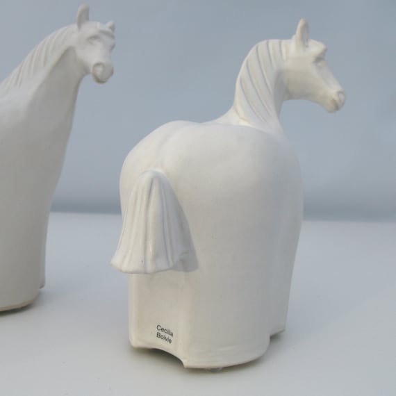 Sculpted Ceramic Horse Black and White Each peice is unique and made by my self Handmade from stoneware clay