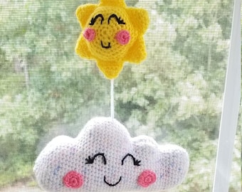 Móvil de crochet de sol y nubes hecho a mano
