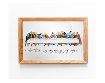 May include: A framed watercolor painting of the Last Supper with the text "do this in memory of me" written below the image.