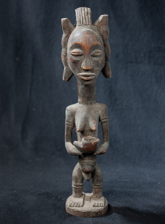 Attie Cote Divore Wooden Carving Attie Cote Divore Wooden Carving