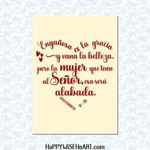 May include: A cream-colored card with red script. The text reads "Enga&ntilde;osa es la gracia y vana la belleza, pero la mujer que teme al Se&ntilde;or, esa ser&aacute; alabada. PROVERBIOS 31:30." The website HAPPYWISEHEART.com is at the bottom.