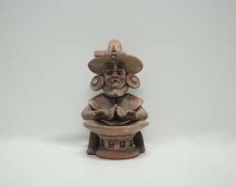 The indigenous shaman burner (copalero)