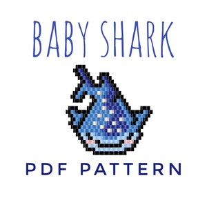 May include: A blue and white pixelated baby shark with a cute expression. The text "BABY SHARK PDF PATTERN" is below the image.