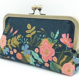 Navy and pink clutch bag 2025