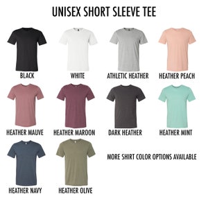 Puede incluir: Un gr&aacute;fico que muestra 10 opciones de color diferentes para una camiseta unisex de manga corta. Los colores incluyen negro, blanco, gris jaspeado atl&eacute;tico, melocot&oacute;n jaspeado, malva jaspeado, granate jaspeado, gris oscuro jaspeado, menta jaspeado, azul marino jaspeado y oliva jaspeado.
