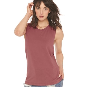May include: A maroon sleeveless muscle tank top with a round neckline. The tank top is made of a soft, comfortable fabric.
