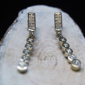 14K white gold dangle earrings with fine diamonds