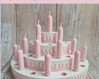 May include: A three-tiered pink and white cake with pink candles. The cake has a dripping frosting design. Text at the top reads: "This is a 3D Printer File. So you can only make this on a 3D Printer!!"