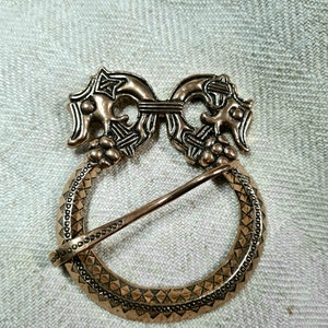 Large bronze fibula from Birka