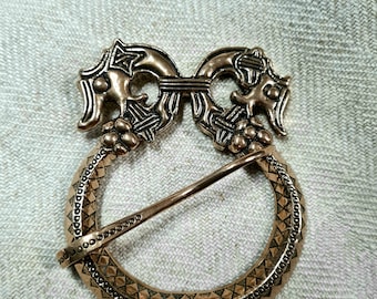 Large bronze fibula from Birka
