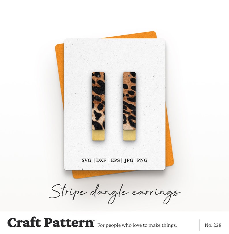 May include: A pair of dangle earrings with a leopard print design and gold accents. The earrings are shown on a white background with a yellow border. SVG | DXF | EPS | JPG | PNG Stripe dangle earrings Craft Pattern For people who love to make things. No. 228