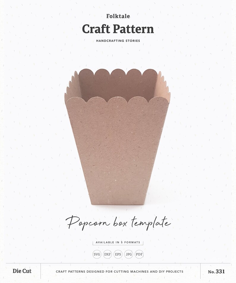 May include: A brown paper popcorn box template, with a scalloped top edge. The template is available in five formats: SVG, DXF, EPS, JPG, and PDF. The text "Popcorn box template" is written in cursive below the box. The text "Craft Pattern" is written in black at the top of the image, with the text "Folktale" above it. The text "Handcrafting Stories" is written in black below "Craft Pattern". The text "Die Cut" is written in black at the bottom left of the image. The text "No. 331" is written in black at the bottom right of the image.
