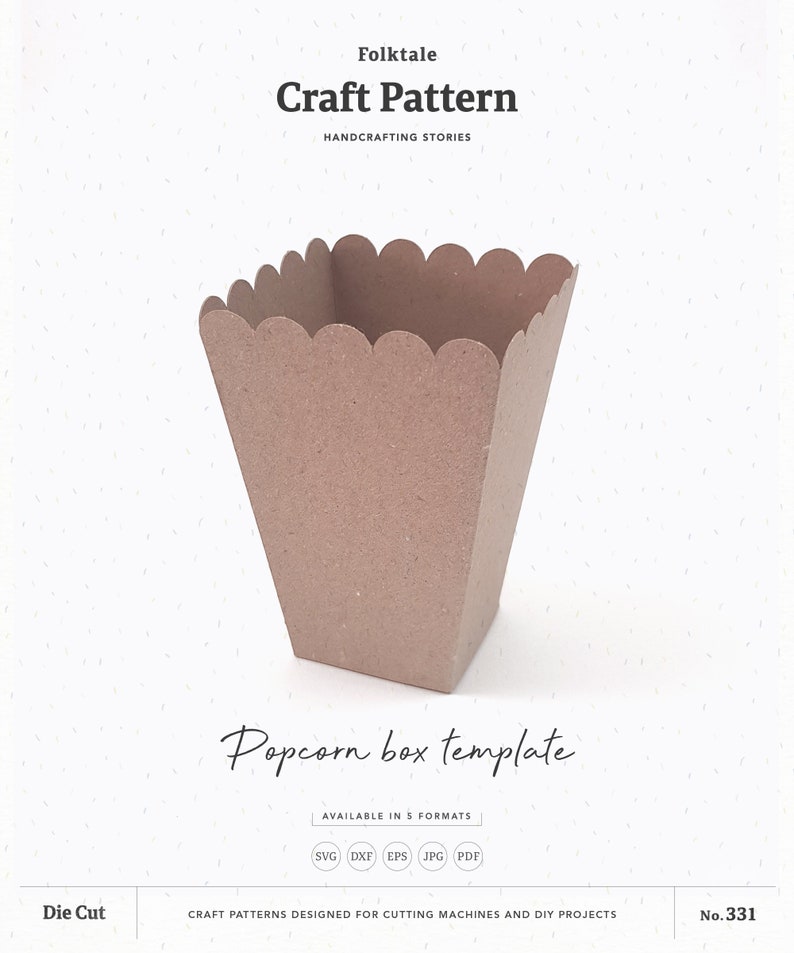 May include: A brown paper popcorn box template craft pattern. The box has a scalloped top edge. The pattern is available in five formats: SVG, DXF, EPS, JPG, and PDF. The text "Popcorn box template" is written in cursive below the box. The text "Die Cut" is in the lower left corner. The text "No. 331" is in the lower right corner.