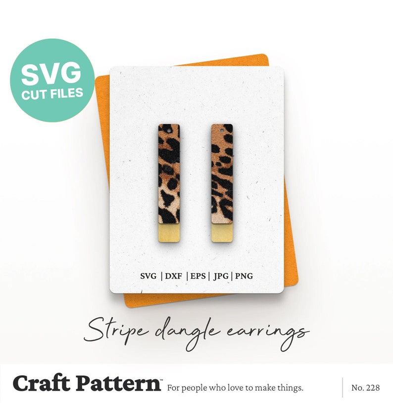 May include: A pair of dangle earrings with a leopard print design and gold accents. The earrings are made of a thin, rectangular shape and are perfect for adding a touch of style to any outfit.