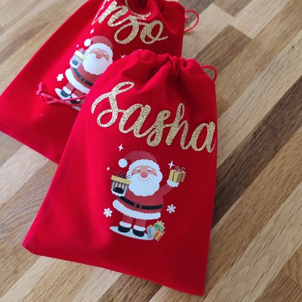 Pochon de Noël pour les cadeaux personnalisée avec prénom, à accrocher à la cheminée. Flocage or doré pailleté, sac cadeau, papier cadeau