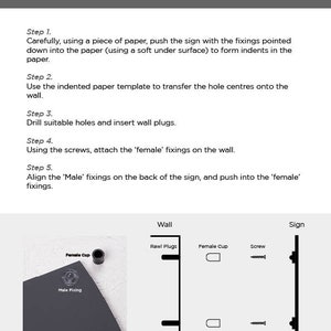 May include: Instructions for hanging a house sign. The instructions include diagrams showing how to use a piece of paper to mark the wall, drill holes, insert wall plugs, attach the female fixings to the wall, and align the male fixings on the back of the sign. The text states that an electric drill or screwdriver is not recommended.