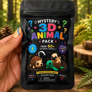 May include: A black resealable pouch labeled Mystery 3D Animal Pack with colorful text and graphics. The packaging features illustrations of a hedgehog, a skunk, a pug, and a turtle, stating it includes 4 random 3D printed animals from 60+ designs.