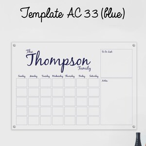 May include: White dry-erase board with a weekly calendar grid, a to-do list section, and a notes section. The board has the text "The Thompson Family" at the top.