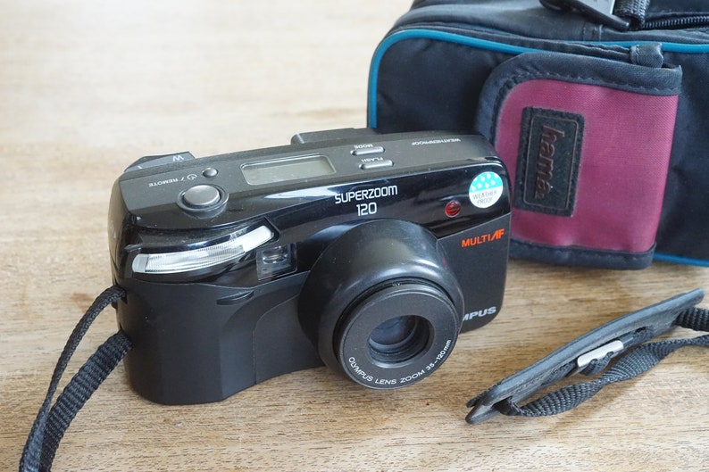 very nice! classic point and shoot Olympus Superzoom 120