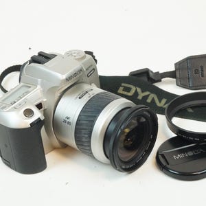 Appareil photo argentique minolta dynax 404si + objectif 75-300mm - Collection