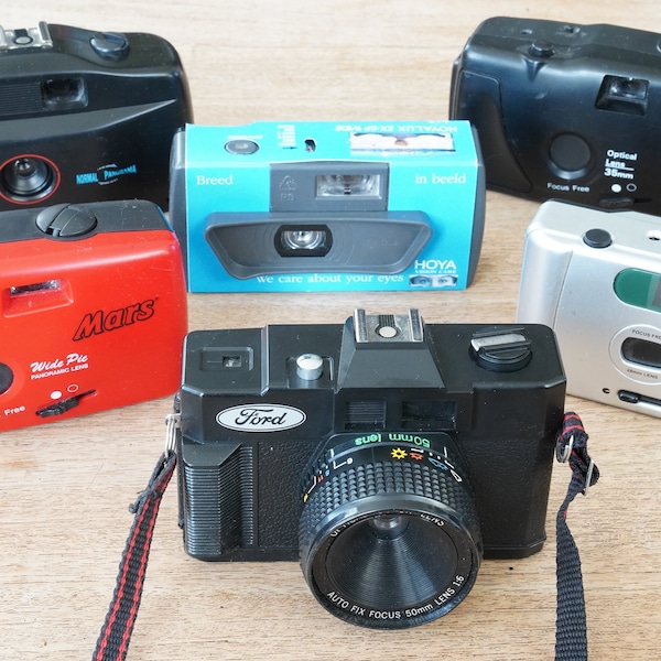 Various promotional cameras for 35mm film, collectors items