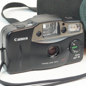 Appareil Photo Canon Prima Junior (AF-8) – Compact Argentique 35mm Autofocus, Flash Intégré