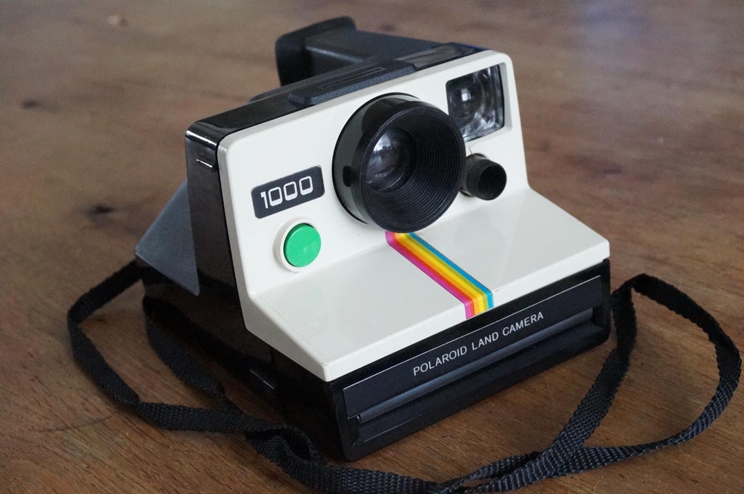 Appareil photo Polaroid 1000 Land / Appareil photo Polaroid Rainbow - bouton d'obturateur vert - Canada