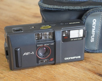Olympus AF-1. The Mju-II predecessor! f/2.8 Compact for 35mm film!