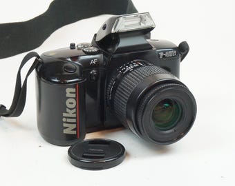 コシナ CT7 コンピューター、35 mm フィルム SLR、f/1.8 50 mm レンズ