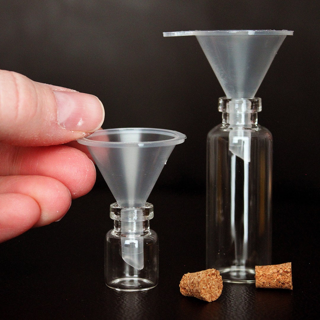 How does one get glitter into a tiny Glass Vial? With a tiny funnel! -  Meyer Imports