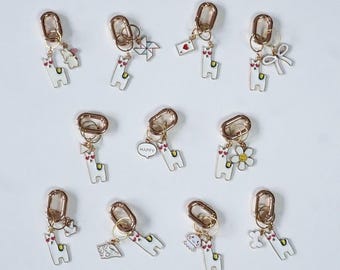 Scrunchie stitch-markers in light gold / stitch marker / maschenmarkierer / progress keeper / charms / pendants / alpaca pendant / lama