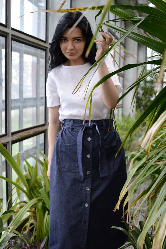 Midi skirt with top pockets in front