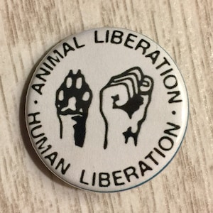 Animal Liberation Human Liberation 1.25 inch pinback | animal rights button | vegan badge