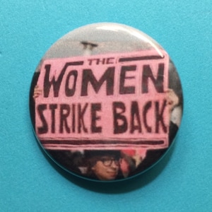 Feminist pin / The Women Strike Back / 1.25 inch pinback button