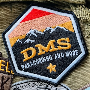 Embroidered Patch Red Orange Yellow Black White DMS Paracording and More Sewn Marketing Emblem Insignia