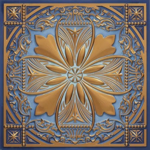 May include: A blue and gold ceramic tile with a decorative floral design. The tile has a raised, embossed pattern and a glossy finish.