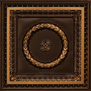 May include: A decorative ceiling tile with a gold and brown finish. The tile features a circular design with a central flower motif and a border of arrows.