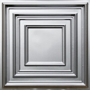 May include: A silver ceiling tile with a raised, multi-layered, square design. The tile has a smooth, metallic finish.