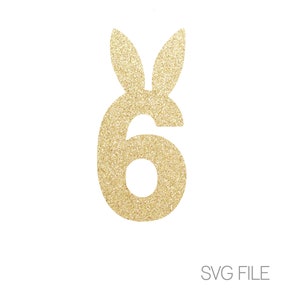 以下が含まれることがあります： ウサギの耳が付いた金色のグリッターの数字6。SVGファイルです。