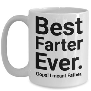 May include: White ceramic mug with black text: "Best Farter Ever." Below, the text reads "Oops! I meant Father." The mug features a curved handle, suitable for hot beverages.