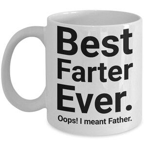 May include: White ceramic mug with a curved handle. The mug features the text "Best Farter Ever." in large black letters, with the text "Oops! I meant Father." below it. A humorous gift idea.
