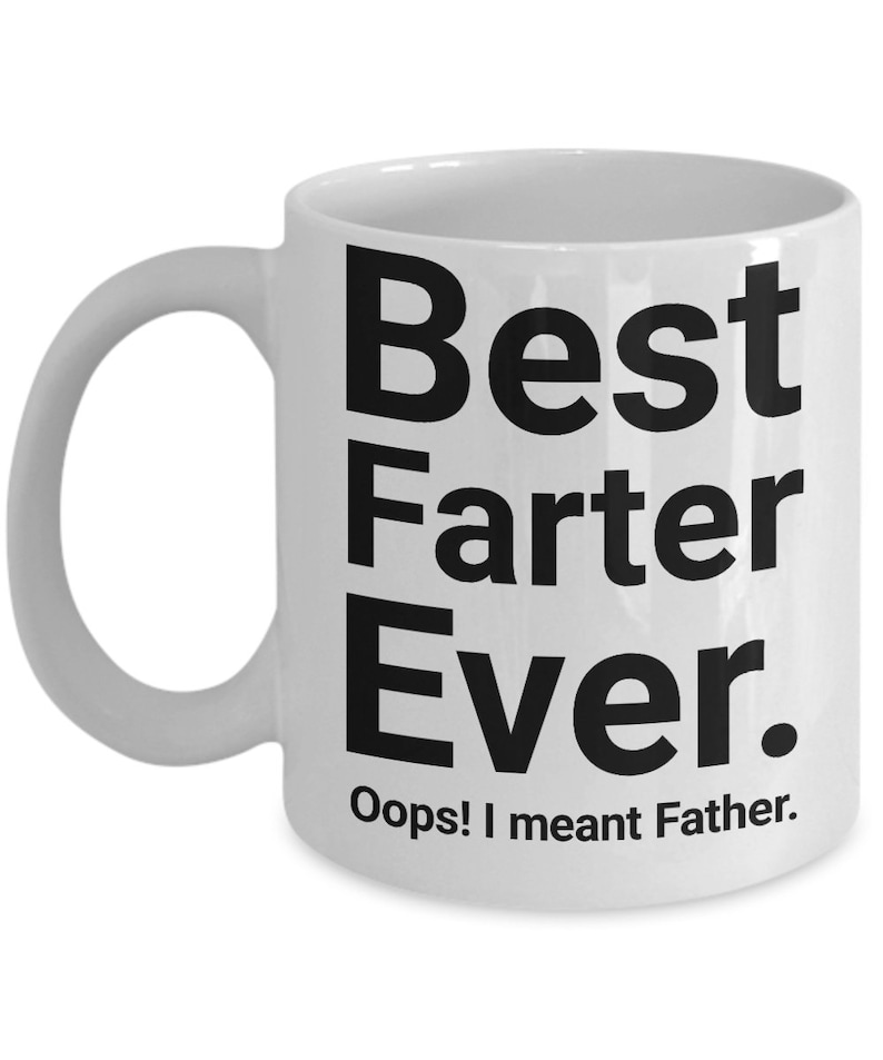 May include: White ceramic mug with a curved handle. The mug features the text "Best Farter Ever." in large black letters, with the text "Oops! I meant Father." below it. A humorous gift idea.